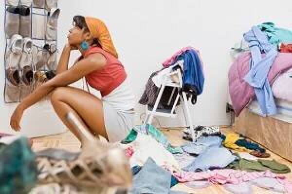 woman-cleaning-closet